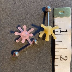 2 Tickler tongue rings